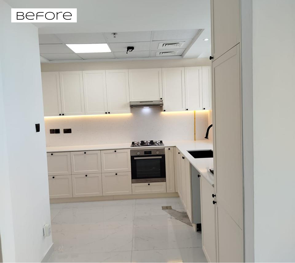 Kitchen before renovation in Dubai — old cabinets and worktop